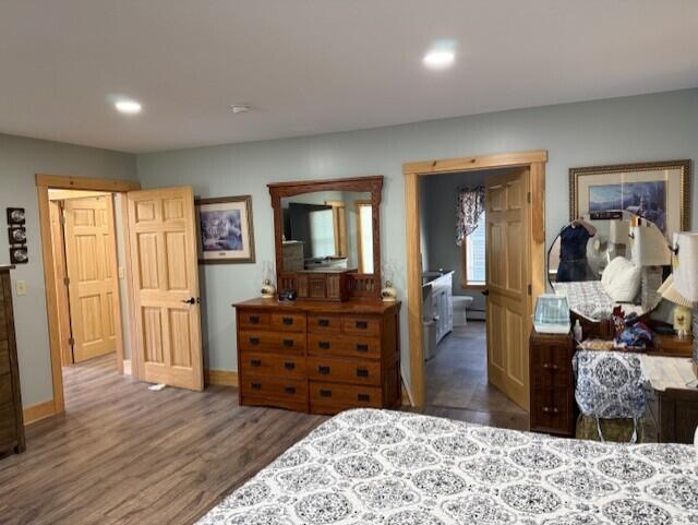 1027 Gardner Creek Rd, Wade, ME 04786 - bedroom featuring wood finished floors and recessed lighting