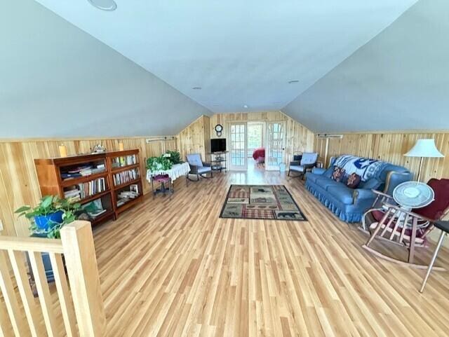 1027 Gardner Creek Rd, Wade, ME 04786 - additional living space with wooden walls, vaulted ceiling, and wood finished floors