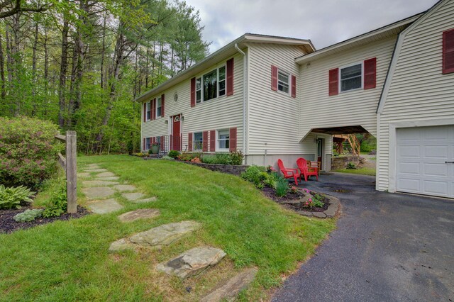 74 Spear Rd, Standish, ME 04084 - split foyer home featuring a front lawn and driveway