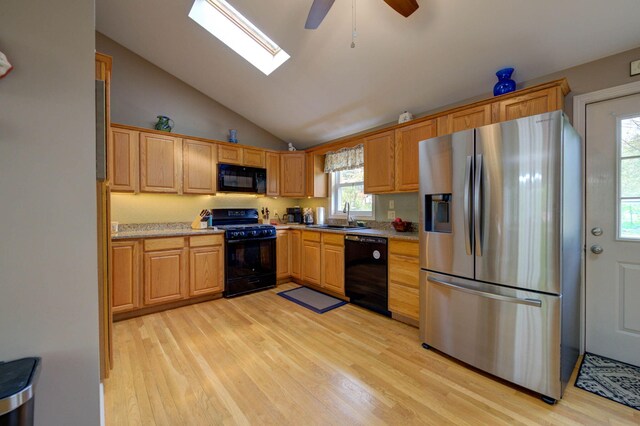 74 Spear Rd, Standish, ME 04084 - kitchen featuring black appliances, light wood-style floors, a ceiling fan, lofted ceiling, and a sink