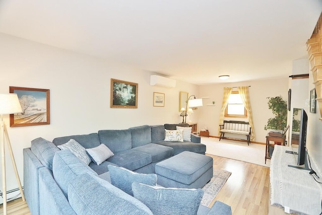 387 Nicolin Rd, Ellsworth, ME 04605 - living area featuring a wall unit AC, a baseboard radiator, light wood-style flooring, and radiator heating unit