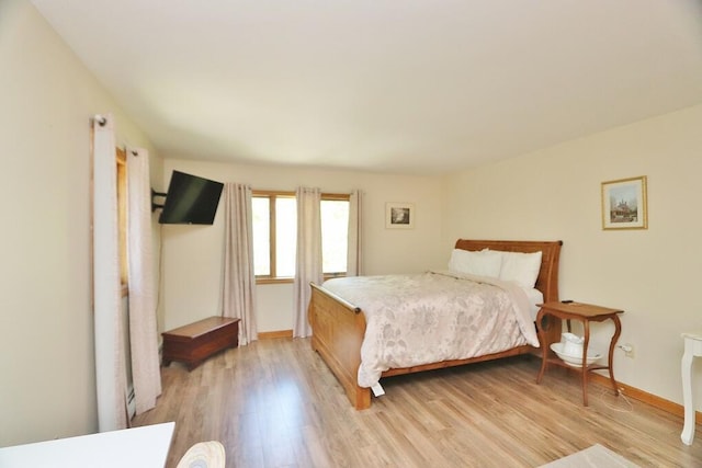 387 Nicolin Rd, Ellsworth, ME 04605 - bedroom with light wood-style flooring and baseboards