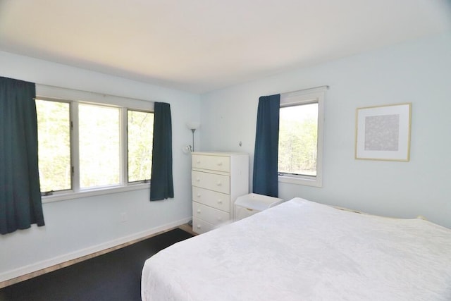387 Nicolin Rd, Ellsworth, ME 04605 - bedroom featuring multiple windows and baseboards