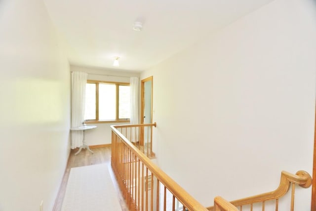 387 Nicolin Rd, Ellsworth, ME 04605 - hall featuring an upstairs landing, light wood-style floors, and baseboards