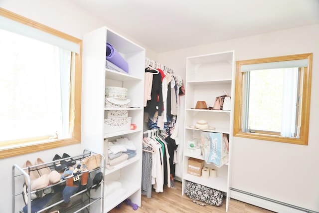 387 Nicolin Rd, Ellsworth, ME 04605 - walk in closet with a baseboard heating unit and wood finished floors