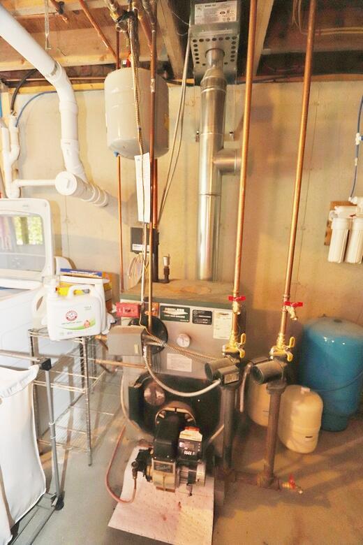 387 Nicolin Rd, Ellsworth, ME 04605 - utility room with a heating unit