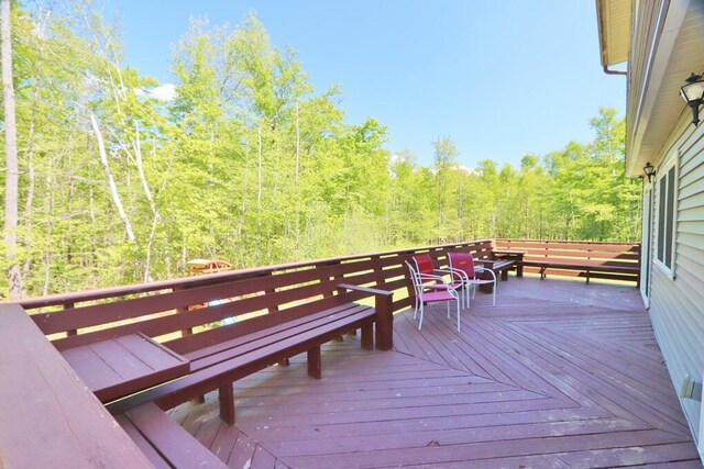 387 Nicolin Rd, Ellsworth, ME 04605 - wooden deck with a view of trees