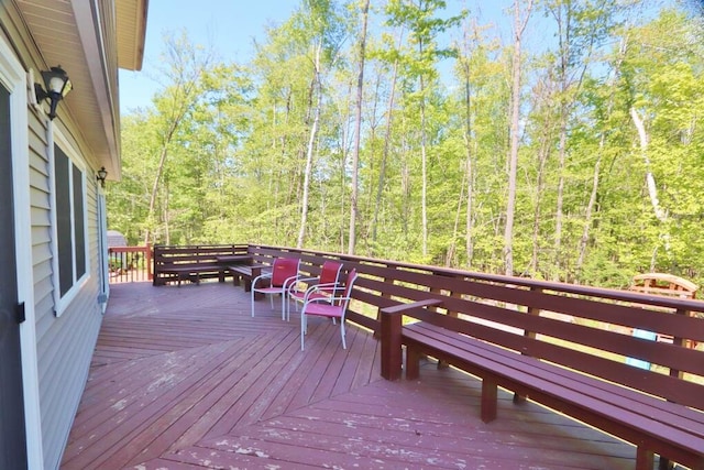 387 Nicolin Rd, Ellsworth, ME 04605 - deck featuring a view of trees