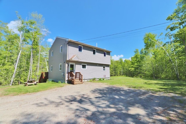 387 Nicolin Rd, Ellsworth, ME 04605 - rear view of property with a lawn