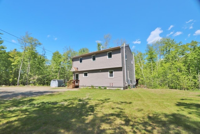 387 Nicolin Rd, Ellsworth, ME 04605 - back of house with a lawn