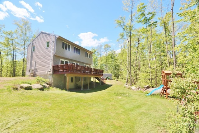 387 Nicolin Rd, Ellsworth, ME 04605 - back of property with a yard and a deck