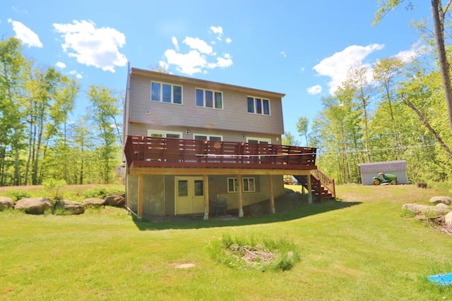 387 Nicolin Rd, Ellsworth, ME 04605 - rear view of property with a deck, a lawn, and stairway