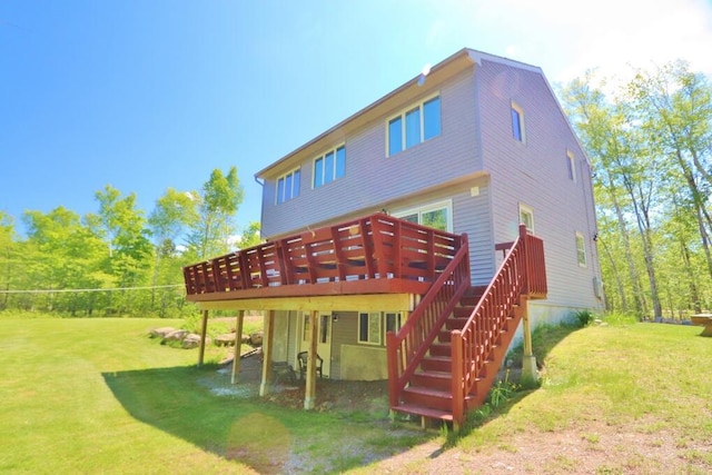 387 Nicolin Rd, Ellsworth, ME 04605 - back of house featuring a lawn and a deck