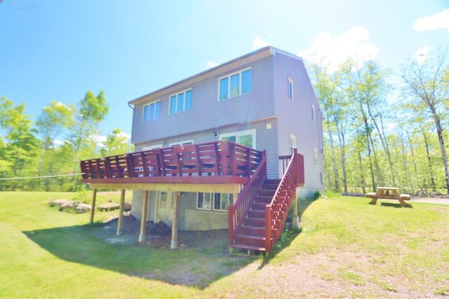 387 Nicolin Rd, Ellsworth, ME 04605 - back of house featuring a deck, a yard, and stairway