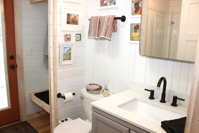 382 Riverbend Rd, Brownfield, ME 04010 - bathroom featuring vanity, toilet, and a shower