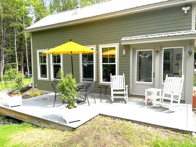 382 Riverbend Rd, Brownfield, ME 04010 - rear view of property with a deck