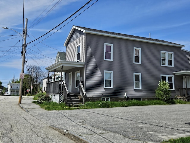 20 Sylvan Ave, Lewiston, ME 04240 - view of property exterior featuring covered porch