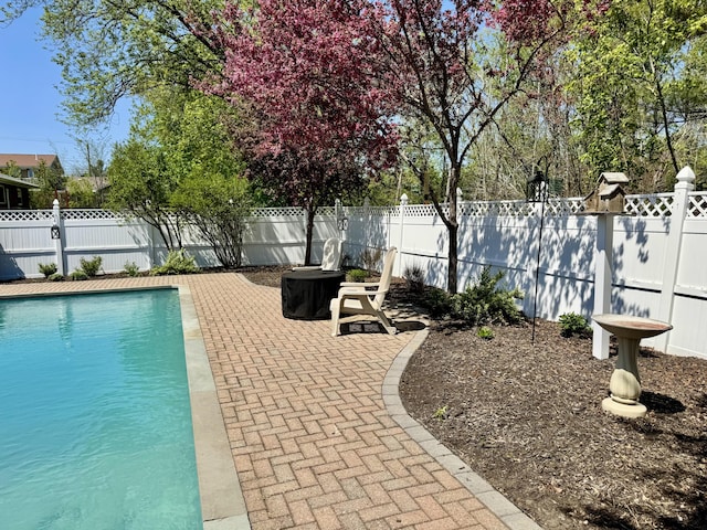 10 Goulet St, Lewiston, ME 04240 - view of pool featuring a fenced backyard and a patio area