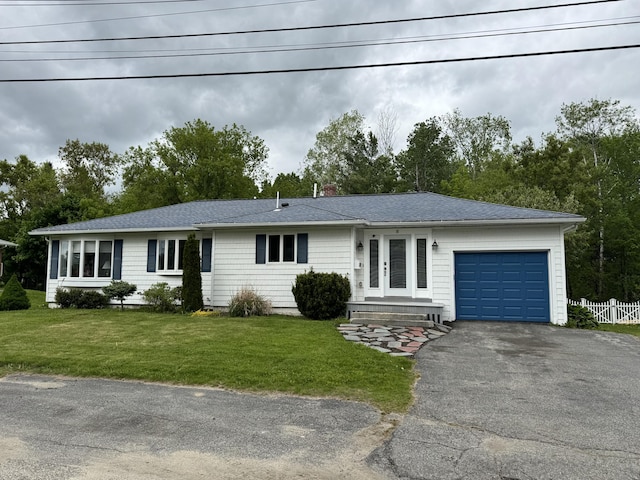 10 Goulet St, Lewiston, ME 04240 - ranch-style home with driveway, a garage, and a shingled roof