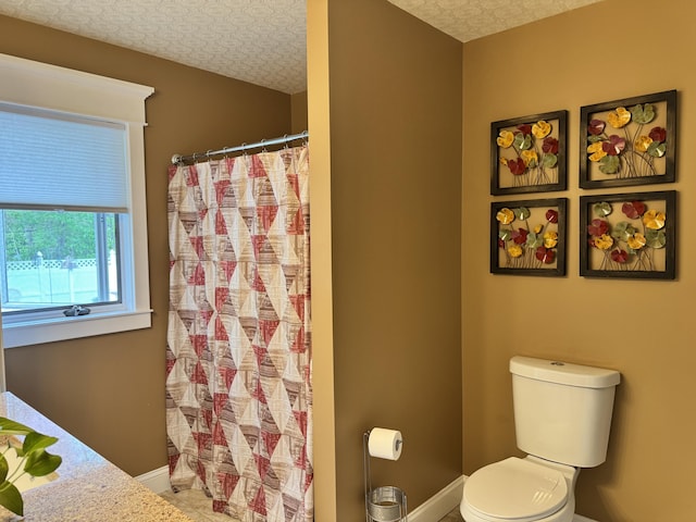 10 Goulet St, Lewiston, ME 04240 - bathroom with toilet and a shower with curtain
