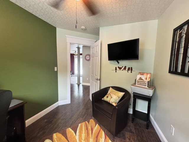 10 Goulet St, Lewiston, ME 04240 - bedroom featuring ornate columns, wood finished floors, and ceiling fan