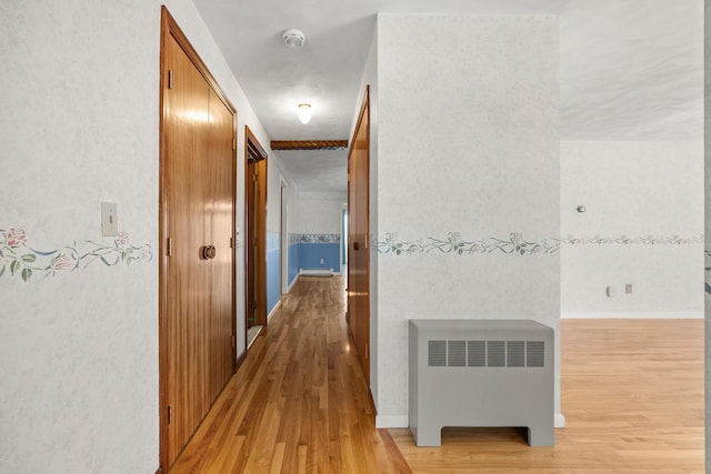 164 Dewitt Ave, Bangor, ME 04401 - hall featuring radiator and light wood-type flooring