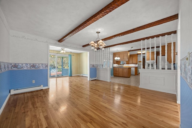 164 Dewitt Ave, Bangor, ME 04401 - unfurnished living room with a baseboard heating unit, wallpapered walls, a chandelier, light wood-style floors, and beam ceiling