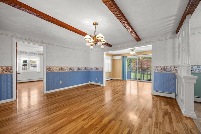 164 Dewitt Ave, Bangor, ME 04401 - spare room with wallpapered walls, baseboard heating, plenty of natural light, wood finished floors, and a chandelier