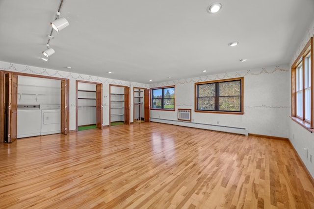 164 Dewitt Ave, Bangor, ME 04401 - unfurnished living room with baseboard heating, baseboards, plenty of natural light, light wood-style floors, and wallpapered walls