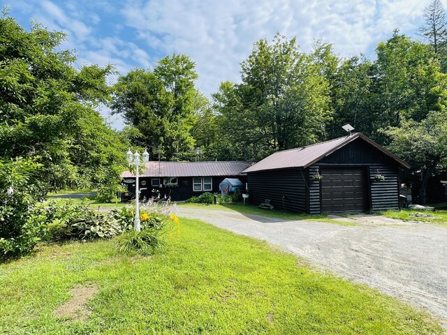 119 Schoodic Lake Rd, Brownville, ME 04414 - photo 1