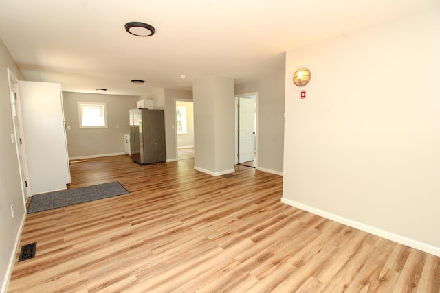 342 Spring Bridge Rd, Greenbush, ME 04418 - spare room featuring light wood-type flooring and baseboards