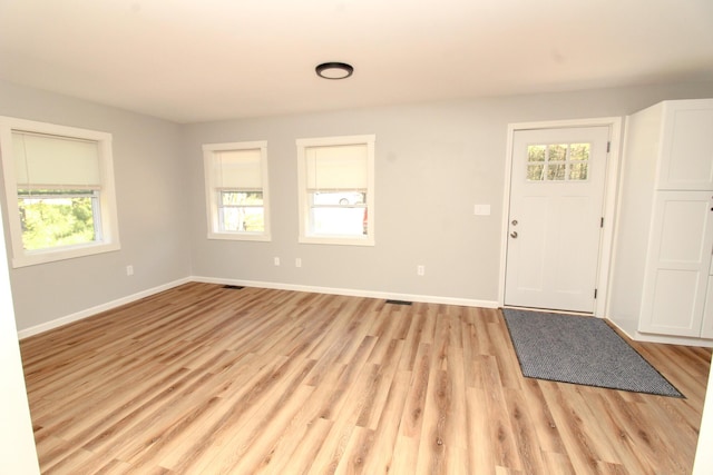 342 Spring Bridge Rd, Greenbush, ME 04418 - entryway with plenty of natural light, light wood-style flooring, and baseboards