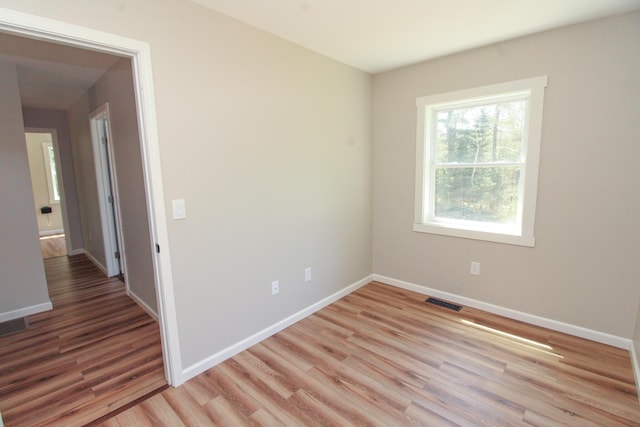 342 Spring Bridge Rd, Greenbush, ME 04418 - unfurnished room with light wood-style flooring and baseboards