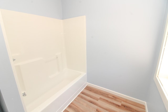 342 Spring Bridge Rd, Greenbush, ME 04418 - bathroom with wood finished floors, baseboards, and a shower