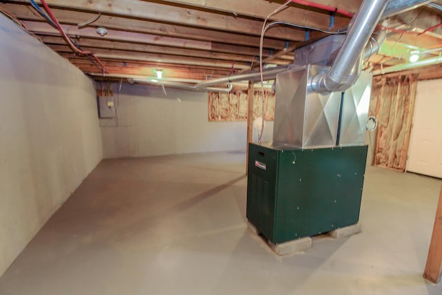 342 Spring Bridge Rd, Greenbush, ME 04418 - unfinished basement featuring electric panel and heating unit