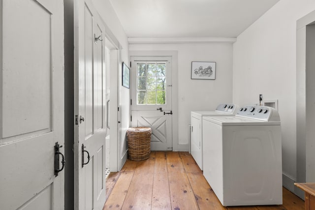 42 Winthrop St, Hallowell, ME 04347 - laundry area featuring washing machine and clothes dryer and light wood-style flooring