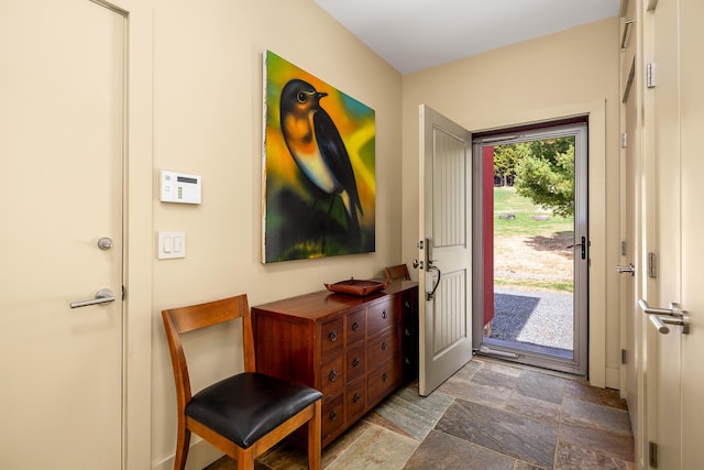 39 Kendall Farm Trl, Rangeley, ME 04970 - foyer entrance with stone finish floors