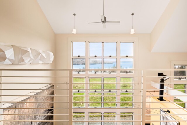 39 Kendall Farm Trl, Rangeley, ME 04970 - doorway to outside featuring a water view, high vaulted ceiling, and ceiling fan