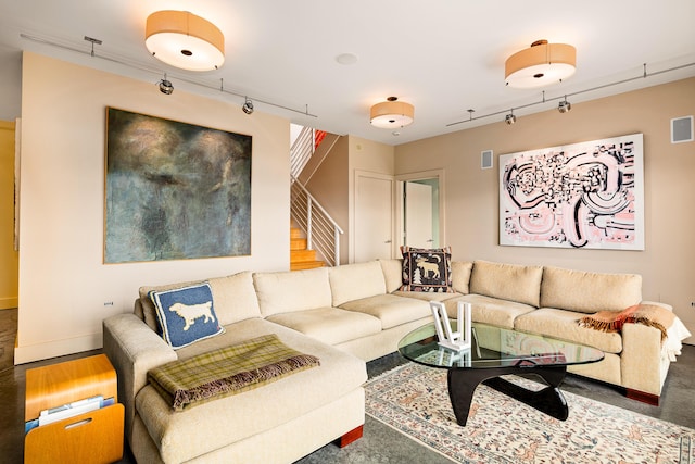 39 Kendall Farm Trl, Rangeley, ME 04970 - living room with stairs and track lighting