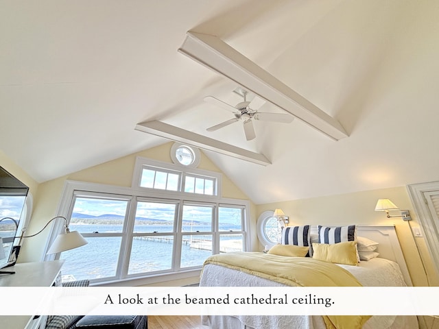 bedroom featuring a water view, a ceiling fan, and vaulted ceiling