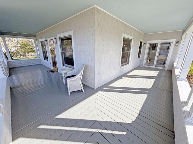 wooden terrace featuring french doors