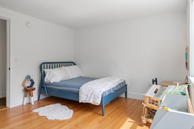 56 Carroll St, Falmouth, ME 04105 - bedroom featuring wood finished floors and baseboards