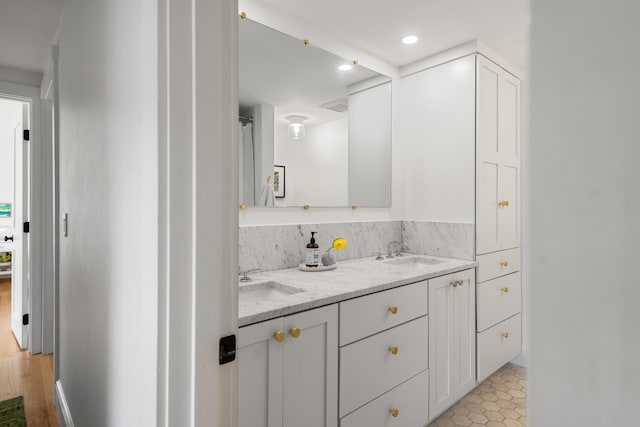 56 Carroll St, Falmouth, ME 04105 - full bath featuring double vanity, recessed lighting, and a shower with shower curtain