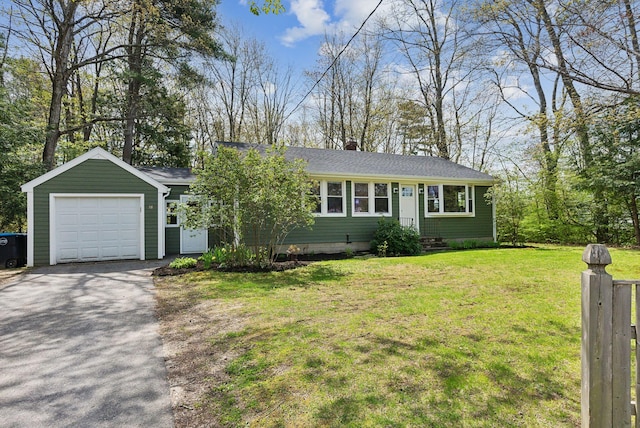 38 Falmouth Rd, Falmouth, ME 04105 - view of front of property with asphalt driveway, a front lawn, a chimney, an attached garage, and a shingled roof