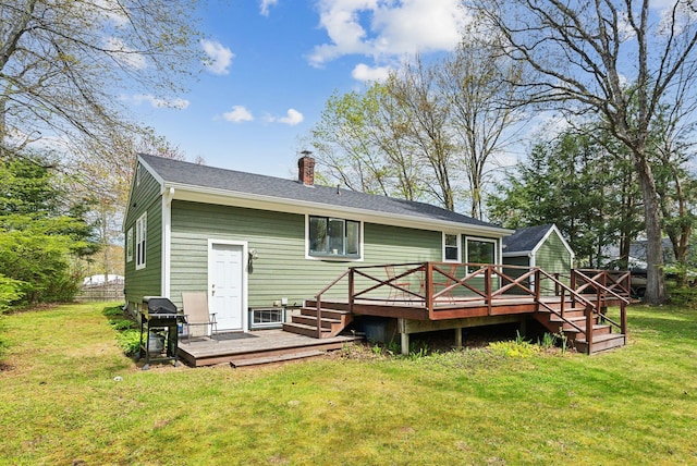38 Falmouth Rd, Falmouth, ME 04105 - rear view of property with a chimney, a deck, and a lawn