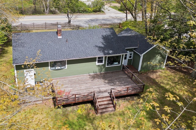 38 Falmouth Rd, Falmouth, ME 04105 - rear view of property featuring a shingled roof, a deck, and a chimney