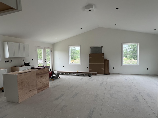 45 Knoll Rd, Poland, ME 04274 - living area with french doors and vaulted ceiling