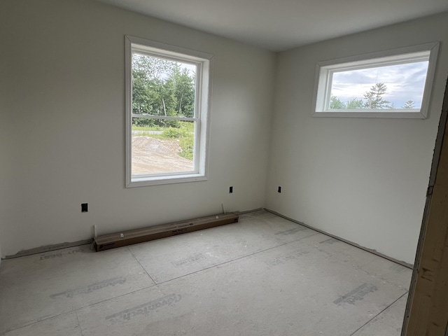 45 Knoll Rd, Poland, ME 04274 - unfurnished room featuring a baseboard heating unit