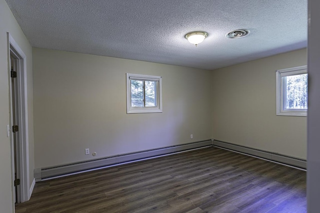29 Fields Pond Rd, Holden, ME 04429 - unfurnished room featuring dark wood finished floors and a textured ceiling