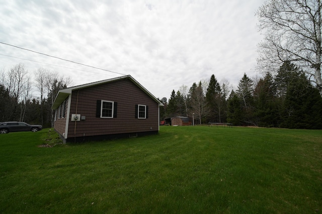 176 Smyrna Center Rd, Smyrna, ME 04780 - view of home's exterior with a lawn